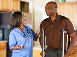 nurse together with disabled man
